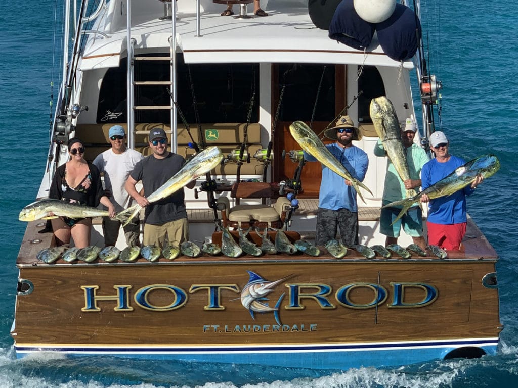 group on the Hot Rod boat with their catch